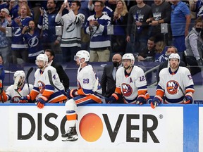 The New York Islanders react to their 8-0 loss to the Tampa Bay Lightning in Game 5 of the Stanley Cup semifinals at Amalie Arena on June 21, 2021 in Tampa.