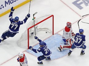 Yanni Gourde #37 of the Tampa Bay Lightning scores a goal past Carey Price #31 of the Montreal Canadiens during the second period in Game One of the 2021 NHL Stanley Cup Final.