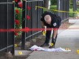 Police investigate a crime scene where three people were shot at the Wentworth Gardens housing complex in the Bridgeport neighbourhood on June 23, 2021 in Chicago.