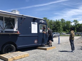 The line for Stoked stands just in front of where the food truck plans to put their new patio.