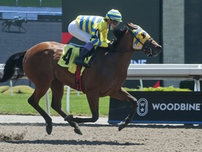 Jockey Daisuke Fukumoto guides Five Days in May to victory in the first race at Woodbine on Saturday. Woodbine started its thoroughbred season, eight weeks after opening day was supposed to take place.