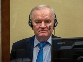 Former Bosnian Serb military leader Ratko Mladic sits in the courtroom prior to the pronouncement of his appeal judgment at the UN International Residual Mechanism for Criminal Tribunals (IRMCT) in The Hague, Netherlands, Tuesday, June 8, 2021.