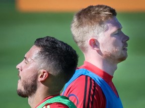 Belgium's Eden Hazard (L) and Kevin De Bruyne take part in a training session on June 14, 2021.