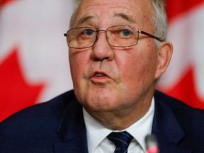 Minister of Public Safety and Emergency Preparedness Bill Blair takes part in a news conference about the dispute between commercial and Mi'kmaw lobster fishers in Nova Scotia, on Parliament Hill in Ottawa, Oct. 19, 2020.