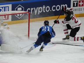 Canada's Nick Paul scores their third goal winning the IIHF World Ice Hockey Championship 2021.