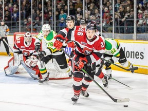 Alec Belanger of the Ottawa 67's stickhandles the puck in his team's defensive zone during an Ontario Hockey League game against the London Knights at the arena at TD Place in Ottawa on Monday, Feb. 17, 2020. London won the game 4-2.