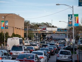 Cars wait at a traffic light on 7th street in Austin, Texas, U.S. March 6, 2020.