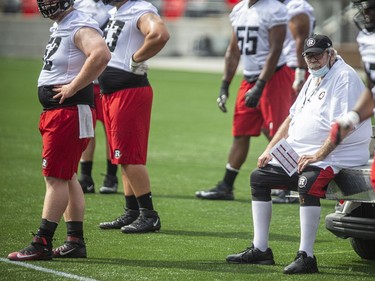 The Ottawa Redblacks returned to the field on Sunday, July 11, 2021, for the club's first practice of this year's training camp. Offensive line coach Bob Wylie was working from a golf cart on Sunday.