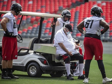 The Ottawa Redblacks returned to the field on Sunday, July 11, 2021, for the club's first practice of this year's training camp. Offensive line coach Bob Wylie was working from a golf cart on Sunday.