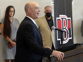 The Ottawa Senators' senior vice-president of player development, Pierre McGuire, speaks Tuesday, July 27, 2021 in Belleville during a preview of the upcoming season for the Sens' AHL affiliate. Listening were the Belleville Sens' marketing manager Breanne Matthews and Ottawa Sens president of business operations Anthony LeBlanc.