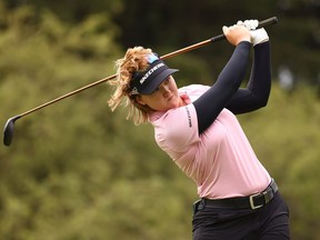 File photo/  Brooke Henderson watches her drive on the seventh hole during the second round of the Marathon LPGA Classic presented by Dana at Highland Meadows Golf Club in Sylvania, Ohio on July 09, 2021 in Sylvania, Ohio.