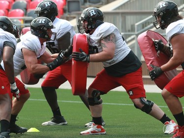 Offensive lineman Andrew Pickett second from right) at the Ottawa Redblacks training camp at TD Place Monday.