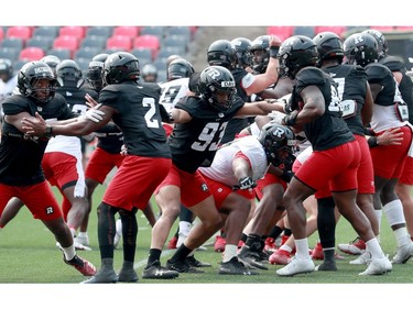 It was hot and sticky as the temperature soared at the Ottawa Redblacks training camp at TD Place Monday.
