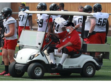 Ottawa Redblacks Coach Bob Wylie watches from the golf cart.