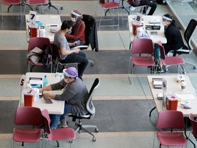 An overhead look at the COVID-19 vaccination centre at Ottawa City Hall on Tuesday.