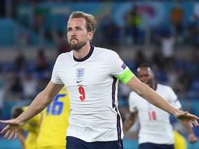 England striker Harry Kane celebrates scoring the team's third goal during the UEFA EURO 2020 quarter-final football match between Ukraine and England at the Olympic Stadium in Rome on July 3, 2021.