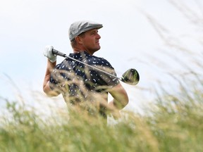 Bryson DeChambeau watches his drive from the 9th tee during his first round of The 149th Open Championship at Royal St George's.