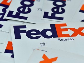 This illustration photo taken on July 2, 2020 shows a FedEx envelope with the company logo in Los Angeles.