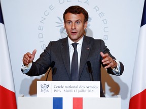 French President Emmanuel Macron delivers a speech to the French Military Forces at the Cercle des Armees in Paris, France, July 13, 2021.