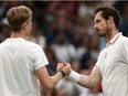 Canada's Denis Shapovalov (left) greets Britain's Andy Murray after winning their men's singles third round match on the fifth day of the 2021 Wimbledon Championships at The All England Tennis Club in Wimbledon, southwest London, on July 2, 2021.