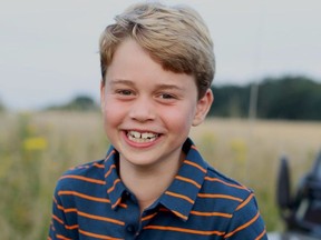 Britain's Prince George poses ahead of his eighth birthday in this picture taken by his mother, Catherine, the Duchess of Cambridge, in Norfolk, Britain July 2021.