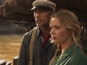 Dwayne Johnson is Frank and Emily Blunt is Lily in Disney’s "Jungle Cruise."