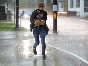 Running for cover from the heavy rainfall was a common fate for people in downtown Ottawa on Tuesday.