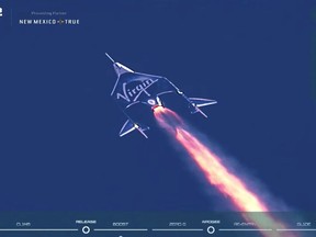 Virgin Galactic's passenger rocket plane VSS Unity, carrying billionaire Richard Branson and crew, starts its ascent to the edge of space above Spaceport America near Truth or Consequences, New Mexico, U.S. July 11, 2021 in a still image from video.