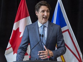 Prime Minister Justin Trudeau makes a statement as he visits Newfoundland and Labrador Premier Andrew Furey at the Confederation Building in St. John's, N.L. on Wednesday, July 28, 2021.