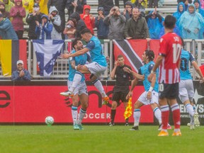 The Halifax Wanderers celebrate a first-half goal against Atlético Ottawa.