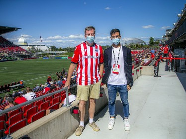 Mayor Jim Watson took a second for a photo with Fernando Lopez, Atletico Ottawa's CEO, as the two were doing a walk through of the south side stands at Atlético Ottawa's first home game against the HFX Wanderers FC on Saturday.