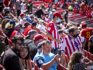 The stands at TD Place fill with fans attending Atletico Ottawa's first home game against the HFX Wanderers FC, Saturday, August 14, 2021.