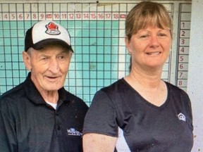 Walter Gretzky with June Dobson. A charge against Dobson, 58, a commanding officer at the Ontario Provincial Police (OPP) detachment in Grenville, over the sale of a hockey stick reported to be used by Wayne Gretzky, was withdrawn, according to her lawyer.