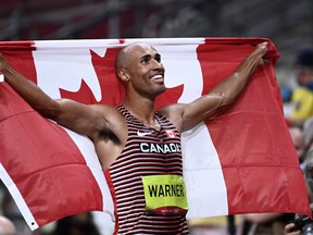 Canada's Damian Warner reacts after winning the men's decathlon event during the Tokyo 2020 Olympic Games at the Olympic Stadium in Tokyo on August 5, 2021.