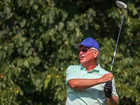 Former Ottawa Sun publisher Rick Gibbons tees off in the Ottawa Sun Scramble's Absolute Comedy C Division Tuesday at Dragonfly Golf Links in Renfrew. One of the founders of the tournament, Gibbons has played in the event all 17 years.