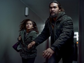 Isabela Merced as Rachel and Jason Mamoa as Ray in Sweet Girl.