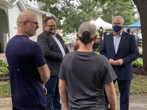 Conservative leader Erin O'Toole and Nepean riding candidate Matt Triemstra, second from left, talk to potential voters at a campaign event in Nepean on Thursday.