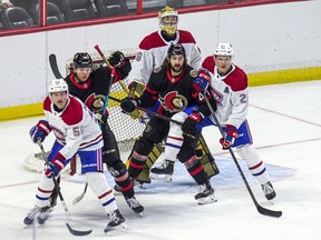 There's a lot of traffic in front of the net of Montreal Canadiens netminder Joe Vrbetic as the Ottawa Senators rookies host the Montreal Canadiens rookies in the first game that spectators have been at a home game at the Canadian Tire Centre in 562 days, Saturday, September 18, 2021. Those in front include Montreal's Mattias Norlander (59) and Kaiden Guhle (21) and Ottawa's Carson Latimer (78) and Mark Kastelic (47).