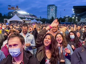 Fans were happy to be back enjoying live music again at the three-day pandemic Bluesfest bash at Lansdowne Park. Above, The Barenaked Ladies wowed fans on Friday night.