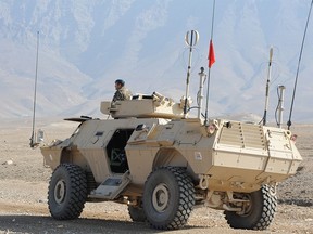 The Taliban have seized large amounts of Afghan military equipment such as this armoured vehicle shown operating outside Kabul in 2013.