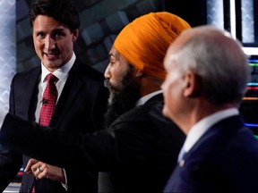 Liberal Leader Justin Trudeau, left to right, NDP Leader Jagmeet Singh, and Conservative Leader Erin O'Toole take part in the federal election English-language Leaders debate in Gatineau September 9, 2021.