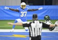 Tevaughn Campbell #37 of the Los Angeles Chargers celebrates after breaking up a pass intended for Denzel Mims #11 of the New York Jets during the second half at SoFi Stadium on November 22, 2020 in Inglewood, California.