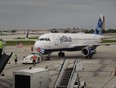 JetBlue Flight 387 pushes back from the gate at Fort Lauderdale-Hollywood International Airport as it prepares for take off.