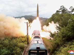 A missile is seen launching during a drill of the Railway Mobile Missile Regiment in North Korea, in this image supplied by North Korea's Korean Central News Agency on September 16, 2021.