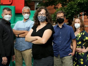 Mindy Sichel (centre) and her husband Kevin Neden (centre right), along with Joël Beddows (far left) and his husband Lawrence Aronovitch and another parent and family doctor, Shoshanah Deaton (far right) are just some of the parents of kids at Francojeunesse School in Sandy Hill that plan to keep their kids home on Election Day.