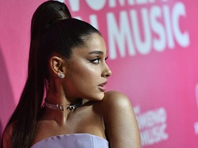 In this file photo taken on December 06, 2018, US singer Ariana Grande attends Billboard's 13th Annual Women In Music event at Pier 36 in New York City.