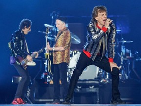 British singer Mick Jagger (R), US drummer Steve Jordan (back), guitar players Keith Richards (2L) and Ronnie Wood (L) perform during the Rolling Stones "No Filter" 2021 North American tour at The Dome at America's Center stadium on September 26, 2021 in St. Louis, Missouri.