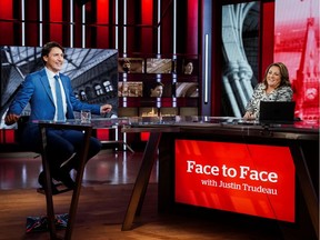 Liberal Leader Justin Trudeau prepares to take part on CBC's Face To Face with host Rosemary Barton in Toronto on Sept. 12, 2021.
