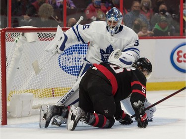 Ottawa Senators right wing Kole Sherwood (56) collides with Toronto Maple Leafs goalie Petr Mrazek (35) in the second period at the Canadian Tire Centre.