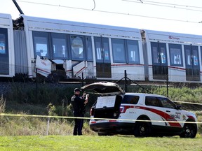 Ottawa Police and OC Transpo officials were on the scene of a LRT derailment near Tremblay station, Sunday.